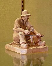 Batteur de faux (avant 1936), terre cuite, Remiremont, musée Charles-Friry.