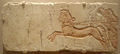 Talatat with a chariot scene. One horse looks directly at the viewer, a very rare occurrence in egyptian art (Museu Egipci de Berlín).