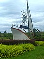 A landmark at the intersection of Federal Route 53 and Seremban-Port Dickson Highway near Lukut. The sign translates to 'Welcome to Port Dickson'.