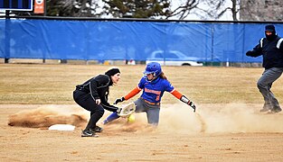 Marauders Softball sliding safe into base