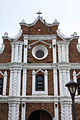 Details of the pediment and pilasters prior to the restoration