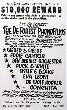 All-text advertisement from the Strand Theater, giving dates, times, and performers' names. At the top, a tagline reads, "$10,000 reward paid to any person who finds a phonograph or similar device used in the phonofilms." The accompanying promotional text describes the slate of sound pictures as "the sensation of the century ... Amazing! Astounding! Unbelievable".