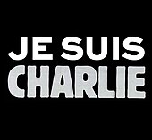 Texte « Je suis Charlie » écrit en blanc et gris sur un fond noir.