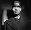 A Pullman Porter aboard a train in one of Chicago's stations