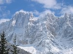 Škrlatica har fått sitt namn av alpglöden ("scharlakansfärg") på västväggen efter solnedgången.