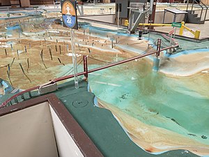 Miniature of the Golden Gate Bridge with a model of the bay, with hundreds of small copper strips in the water.