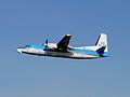 A KLM Cityhopper Fokker 50 taking off Amsterdam