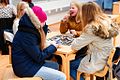 Image 10Young girls playing a board game in the Iisalmi library in Finland, 2016 (from Board game)