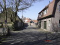 Street in Den Burg, with the church in the background.