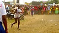 Female athlete during mt Cameroon race of hope at few meter to the finish line