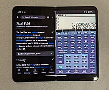 A black foldable smartphone running Wikipedia and a calculator app