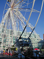 Four-car 30 m tall drive-in Ferris wheel at Harbourfront, Toronto, Canada, in 2004[182]