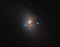 NGC 1222 contains three compact regions.[32]