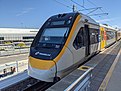 A Queensland Rail NGR train at Domestic Terminal