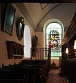 Das schöne Fenster, das Kirchengefängnis und die ältesten erhaltenen Sitzbänke