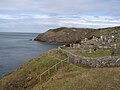 View of the graveyard at Llanbadrig church showing its position on the coast.