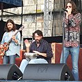 Steve Gorman (center) performing with Black Crowes bandmates Sven Pipian and Chris Robinson.