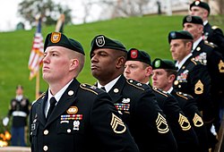 Special Forces Green Beret soldiers from each of the Army’s seven Special Forces Groups stand silent watch during the wreath-laying ceremony at the grave of President John F. Kennedy, Nov. 17, 2011, at Arlington National Cemetery.