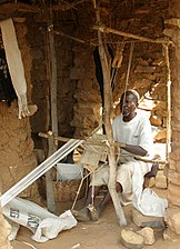 Weaving bogolan in Mali. Note toggle treadles.