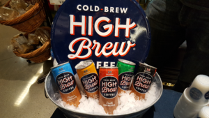 5 flavours of High Brew-branded cans in a tub of ice