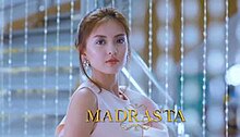 An image of Arra San Agustin, with stairs and crystals on the background. The series title is displayed on the lower side of the image.