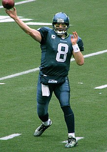 Photo of Hasselbeck throwing a football during a game with the Seahawks