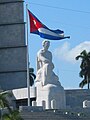 Statue of Martí with Cuban flag