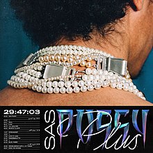 A man with pearls around his neck (back)