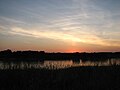 Sunset over the river Scheldt seen from Hemiksem.