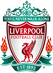 The words "Liverpool Football Club" are in the centre of a pennant, with flames either side. The words "You'll Never Walk Alone" adorn the top of the emblem in a green design, "EST 1892" is at the bottom