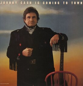 Обложка альбома Джонни Кэша «Johnny Cash Is Coming to Town» (1987)