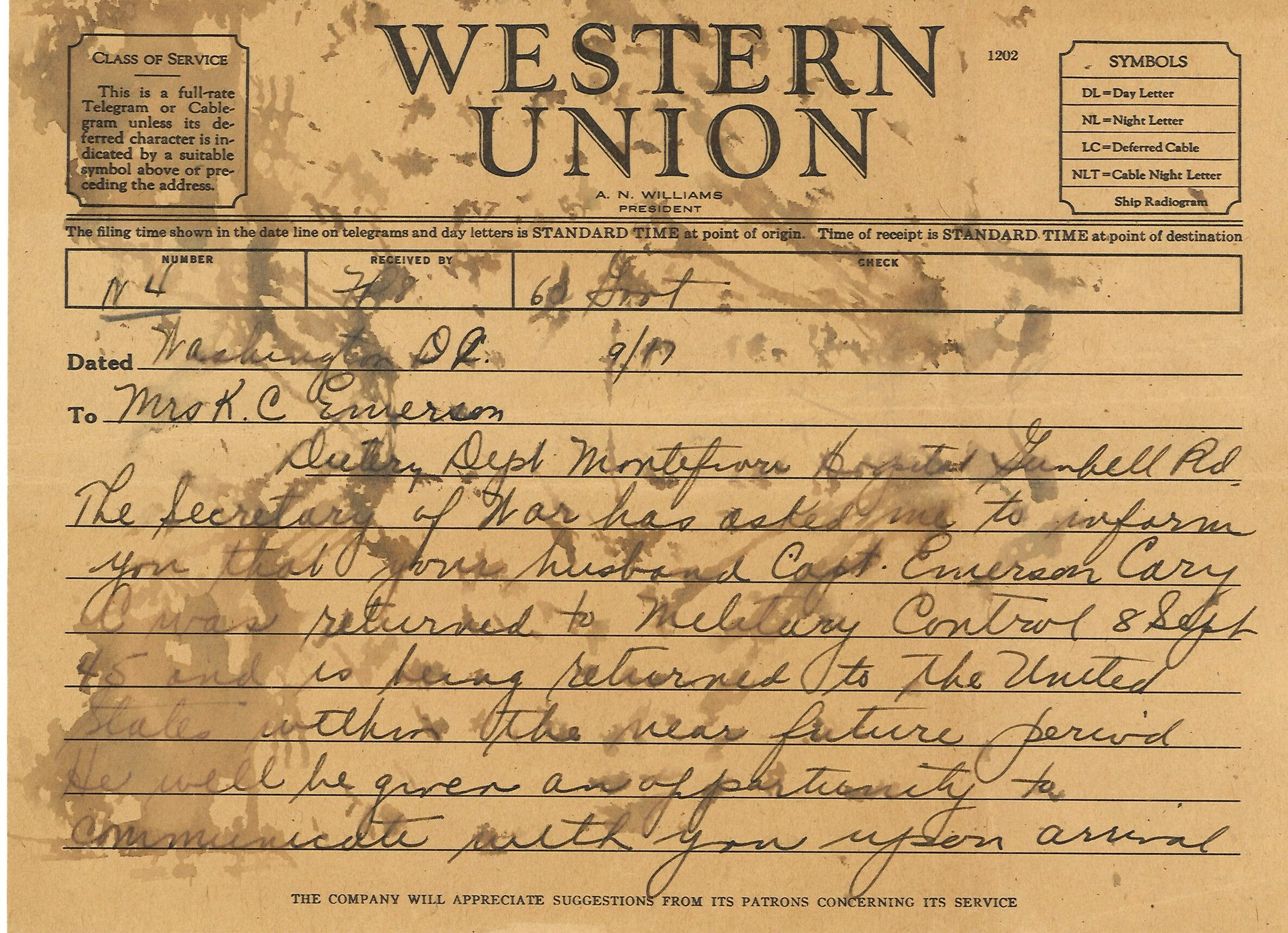 Yellowed telegram form with smudged ink handwriting