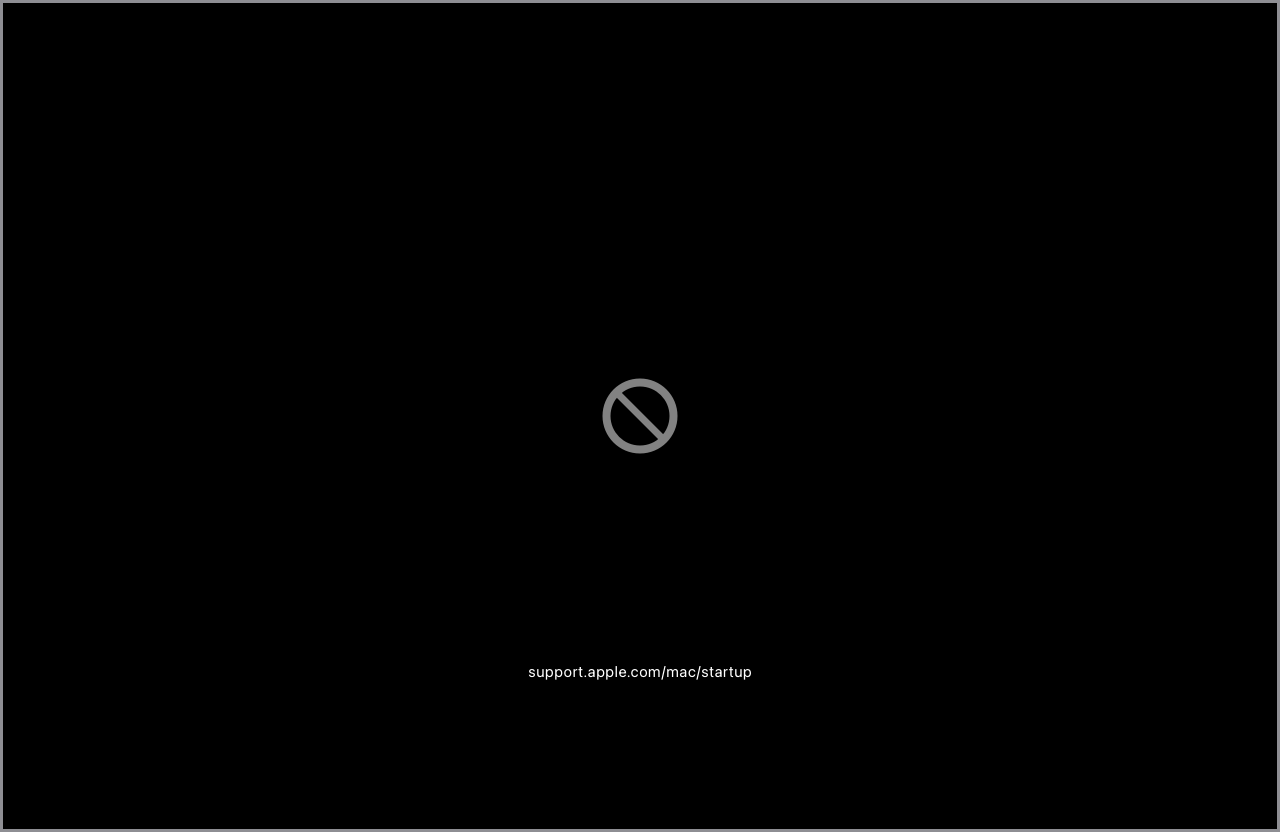 شاشة بدء تشغيل macOS تعرض علامة منع وعنوان URL: support.apple.com/mac/startup