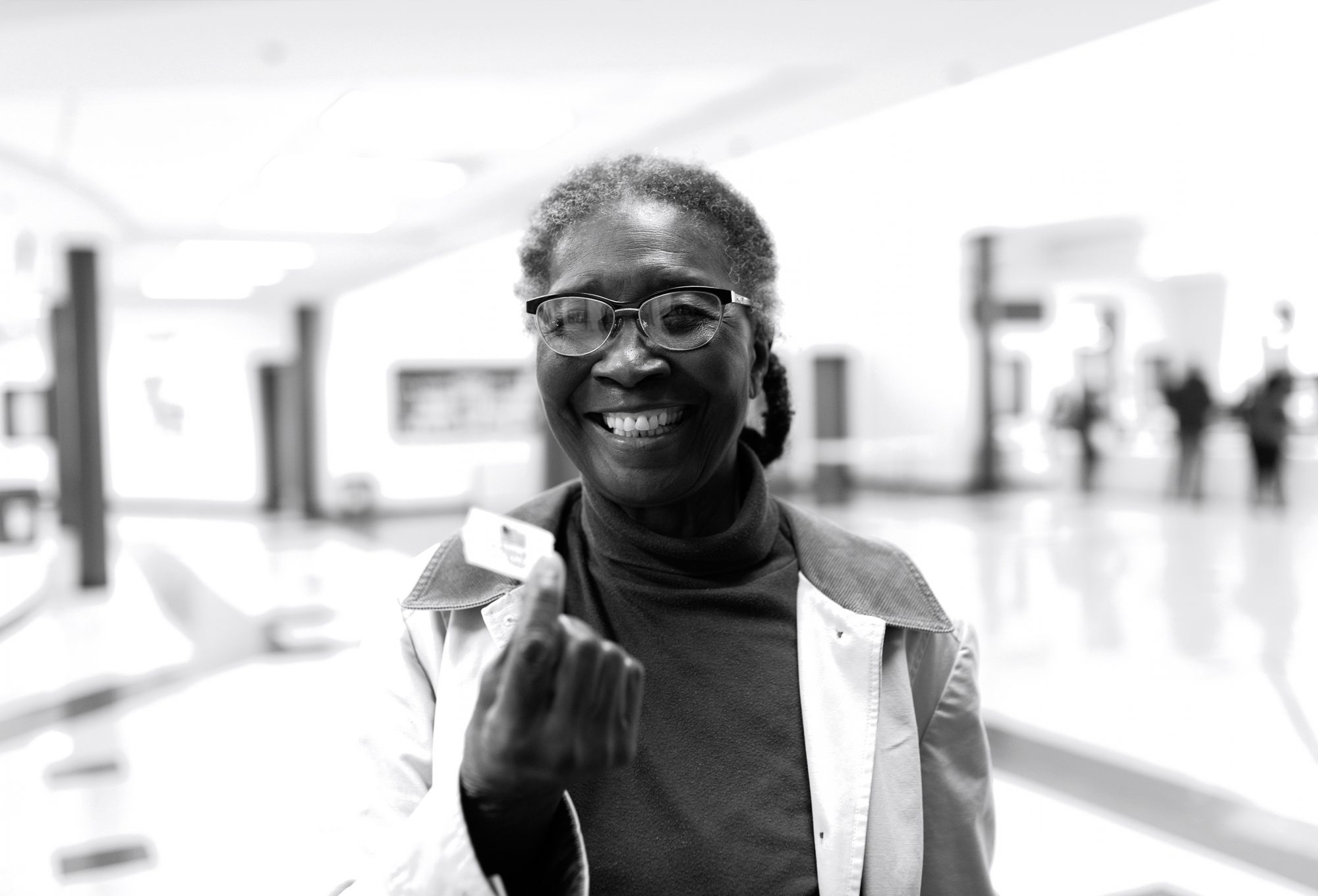 A voter holds a sticker on Election Day 2018. Credit: Danny Sax