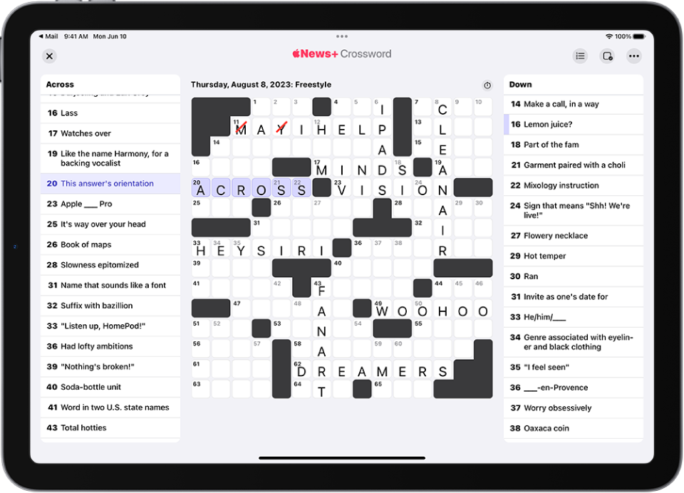 A partially filled crossword puzzle, with the clues on each side.