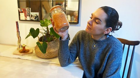 Laura with a jar of lentils