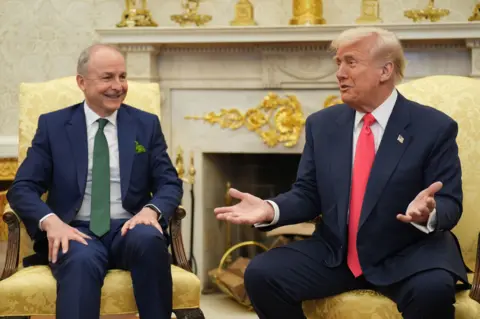 Michael Martin and Donald Trump sit in the oval office