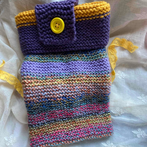 Cosy hand knitted hot water bottle cover