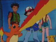 Charmander de Ash usando lanzallamas.