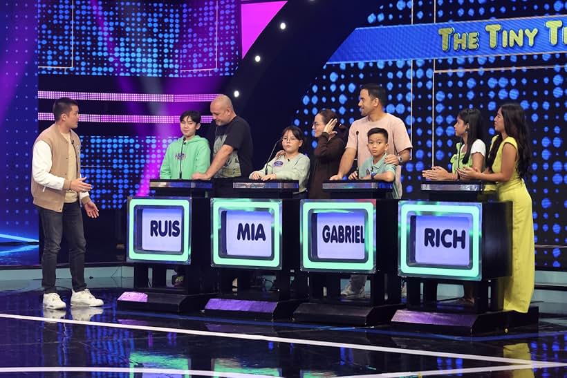 Dingdong Dantes, Matet De Leon, Ryan Eigenmann, Neil Ryan Sese, Rich Cabasag, Ruis Eigenmann, Gabriel Sese, Mia Estrada, and Barbara Miguel in Family Feud (2022)