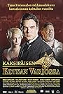 Vesa-Matti Loiri, Helena Vierikko, and Mikko Leppilampi in Kaksipäisen kotkan varjossa (2005)