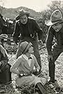 Dustin Farnum, Gilbert Holmes, Francis McDonald, and Doris Pawn in The Buster (1923)