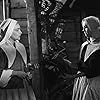 Mylène Demongeot and Simone Signoret in Les sorcières de Salem (1957)