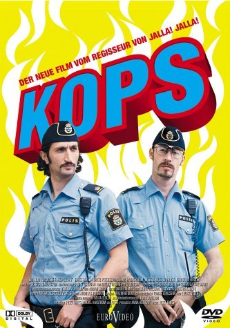 Fares Fares and Torkel Petersson in Kopps (2003)