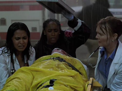 Laura Innes, Lyn Alicia Henderson, and Parminder Nagra in ER (1994)