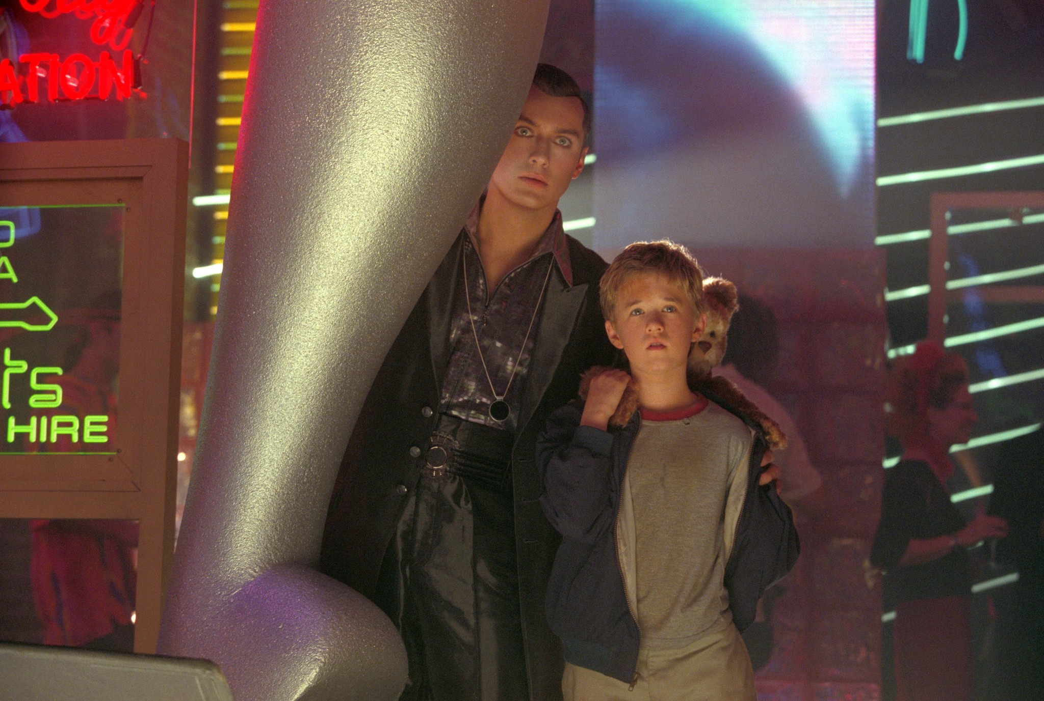 Jude Law, Haley Joel Osment, and Jack Angel in A.I. Artificial Intelligence (2001)