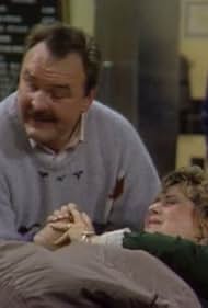 Dick Butkus and Alix Elias in Night Court (1984)