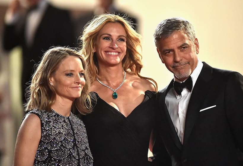 Jodie Foster, Julia Roberts, George Clooney pose on May 12, 2016, before leaving the Festival Palace after the screening of the film 'Money Monster' at the 69th Cannes Film Festival in Cannes.