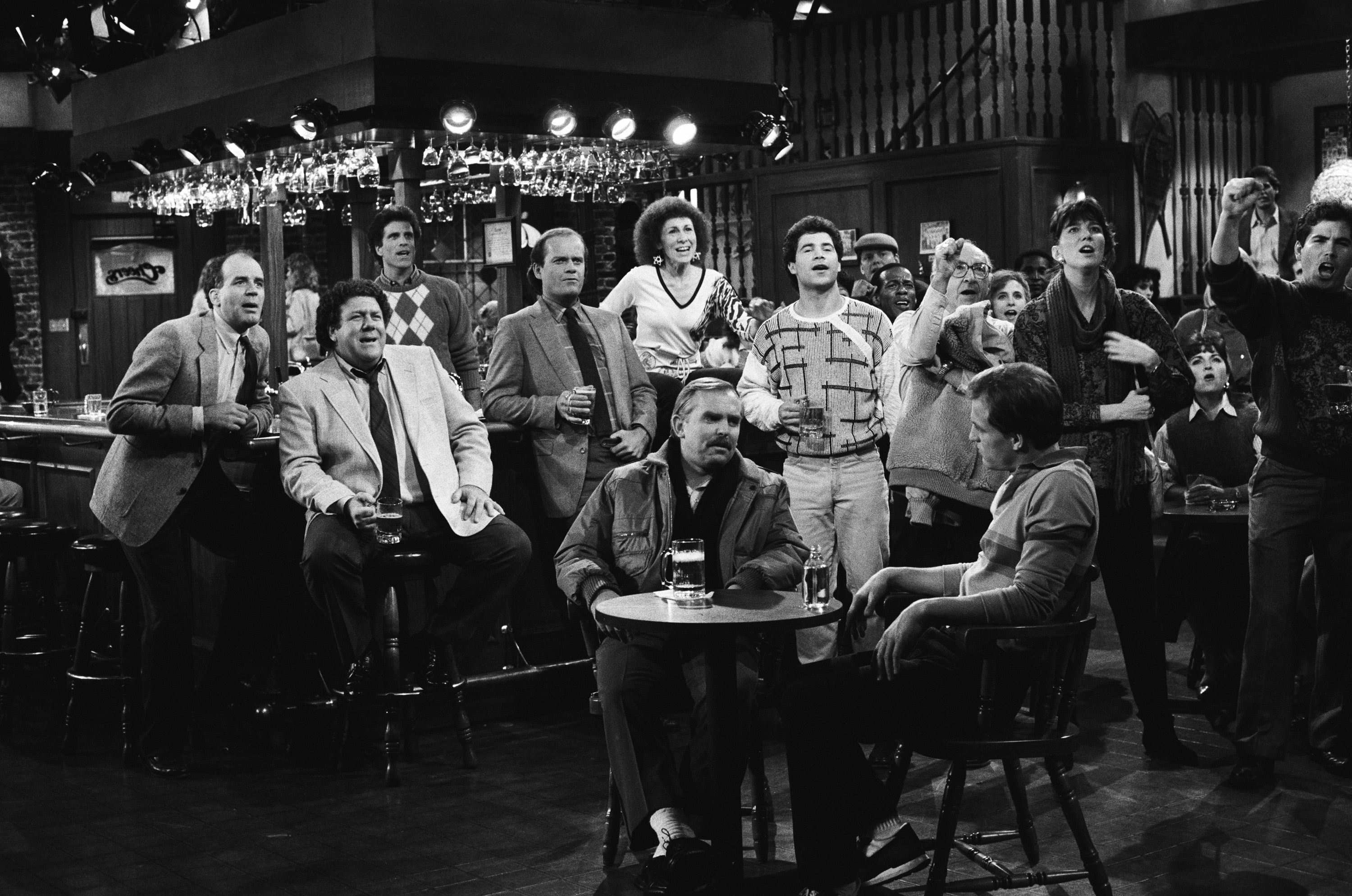 Woody Harrelson, Ted Danson, Kelsey Grammer, John Ratzenberger, George Wendt, Fernando Cubillas, Steve Giannelli, Johnny Gilbert, Hugh Maguire, Philip Perlman, Rhea Perlman, and Michael Sax in Cheers (1982)