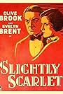 Evelyn Brent and Clive Brook in Slightly Scarlet (1930)